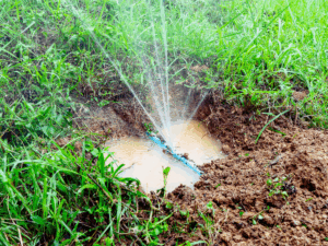 spraying leak in irrigation line
